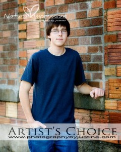 Senior pictures by brick wall photo