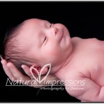 newborn photo with mom's hands classic newborn photo