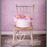 Newborn baby girl on old chair newborn baby girl on chair