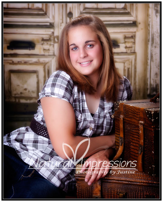 Studio portrait of senior girl senior girl inddor photo