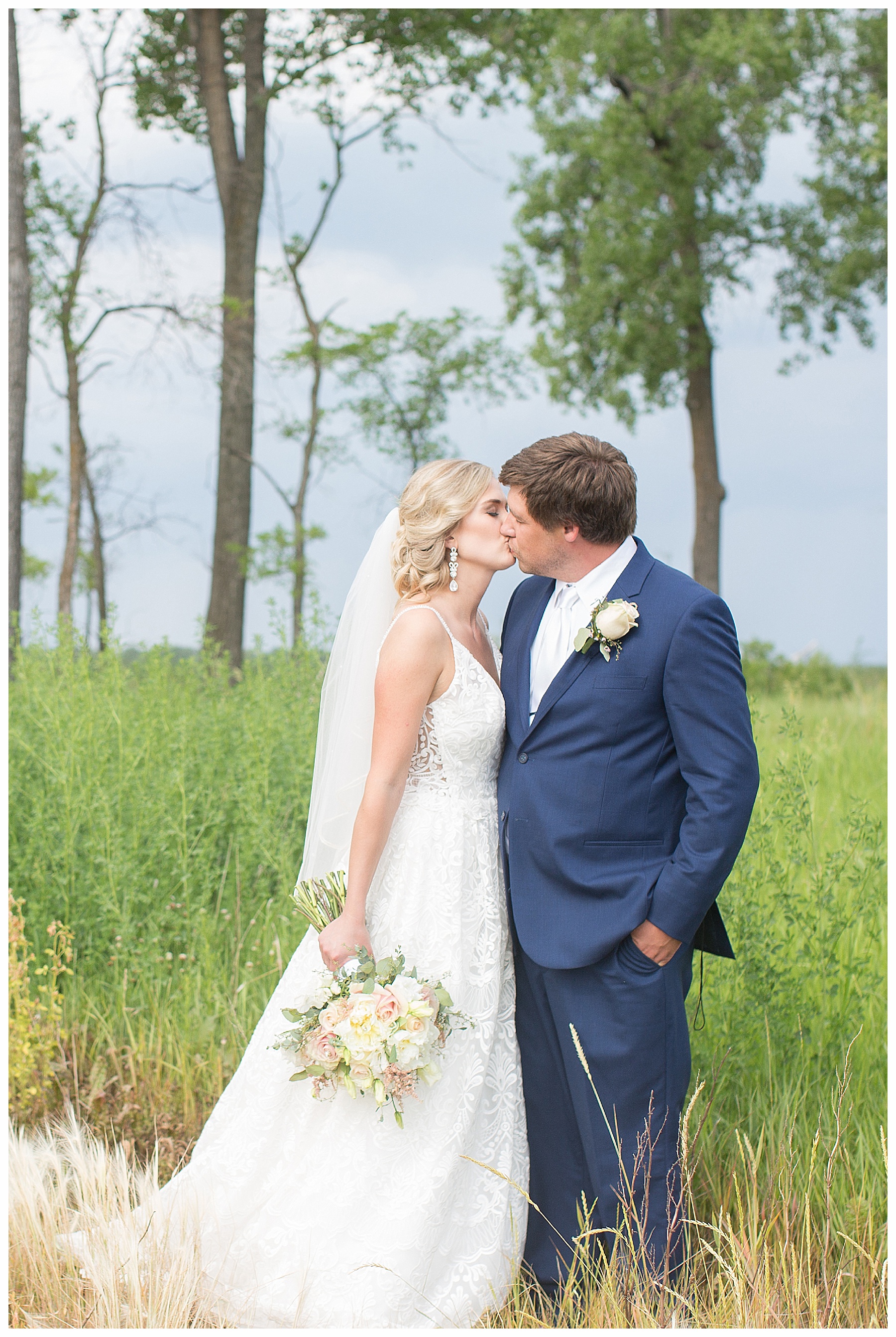 bride and groom kissing